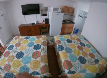 Efficiency room kitchenette and double queen beds at Sea Chest Motel Wildwood Crest