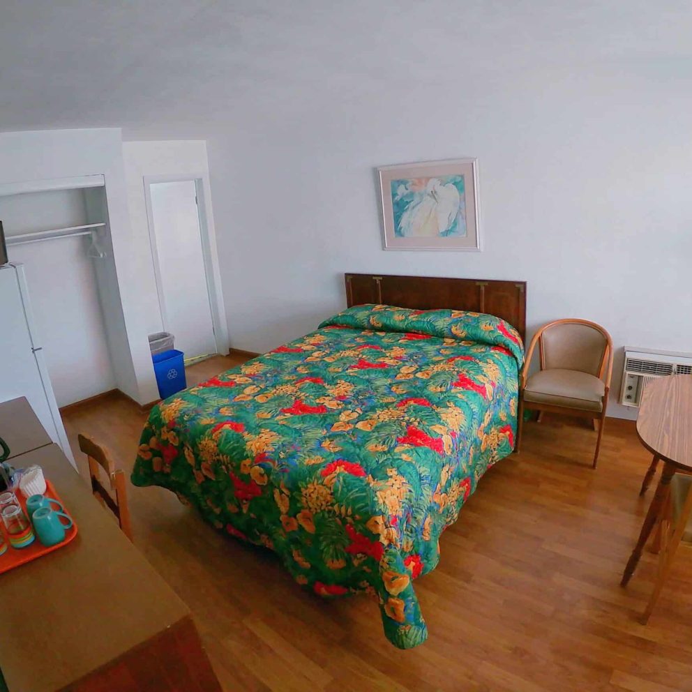 Single queen bed room interior at Sea Chest Motel Wildwood Crest